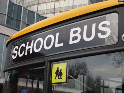 Bus taking children into school