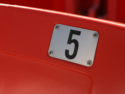 A number 5 on a red background