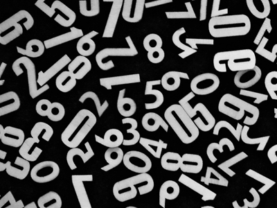 A jumble of numbers on a black background