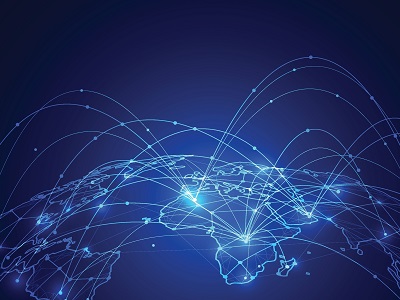 Stylised world map at night with glowing blue lines and nodes showing global data connections and network routes across continents.