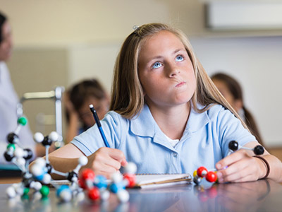 Girl working out calculations