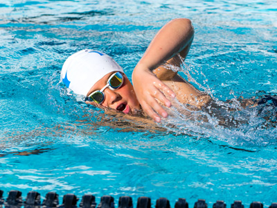 French boy swimming