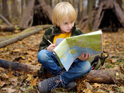 Child reading a map