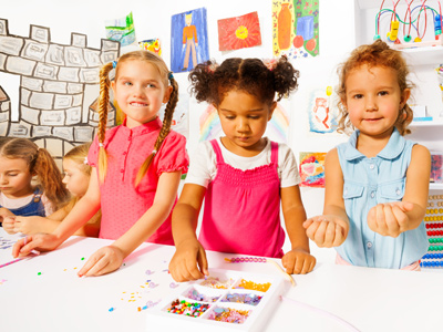 Children making jewellery