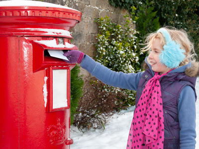 Child posting a letter