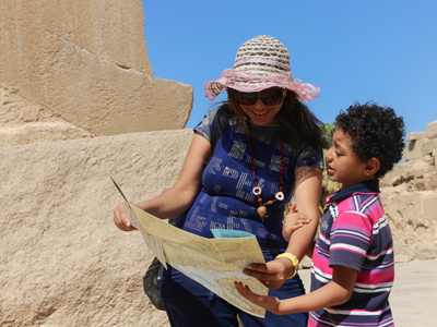 Parent and child exploring ruins