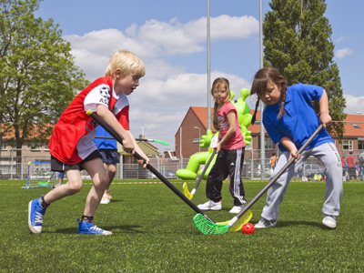 Children playing hockey