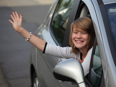 Girl waving goodbye