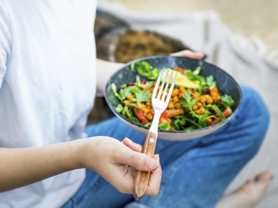 Boy eating salad