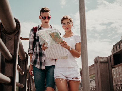 Teens searching on map