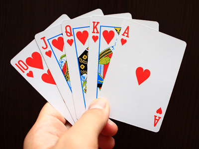A royal-flush hand of cards