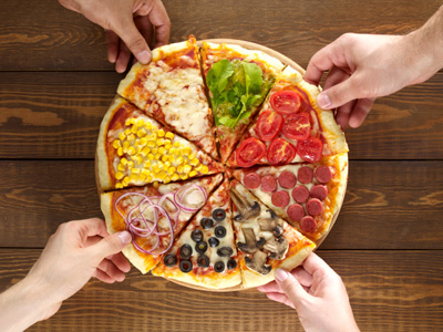 A pizza cut into eight pieces.