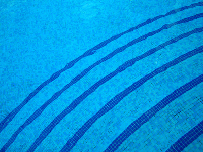 Curved lines on the bottom of a swimming pool