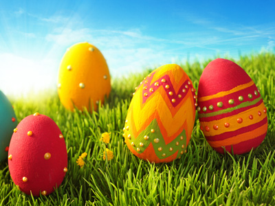 Colourful Easter eggs on grass.