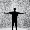 Man Standing In The Rain