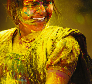 KS1 Religious Education Illustration  – Smiling Girl Covered in Paint
