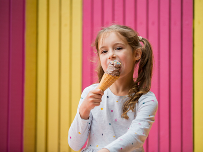 Child eating chocolate ice-cream