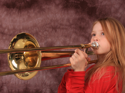 Child playing the trombone