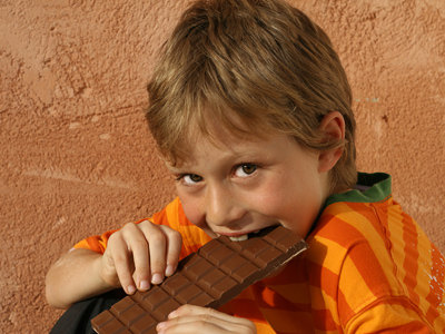 Child eating chocolate
