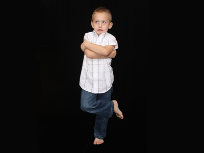 Child standing on one leg