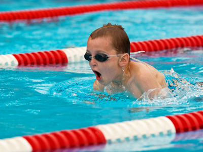 Child swimming in race