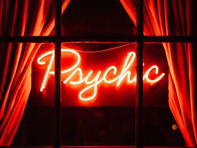 Neon sign saying 'psychic'