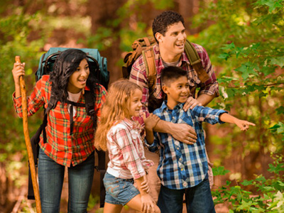 Parents on hiking holiday with children