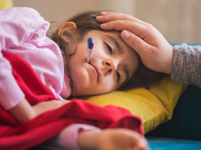 Concerned parent keeping a sick child at home