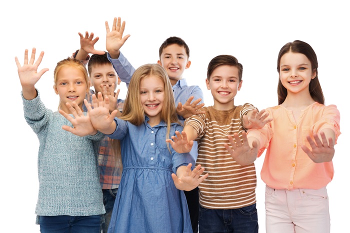 Happy Group of Children with the Hands in the Air