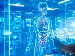 A healthcare professional using a futuristic digital interface to view a high-tech 3D anatomical model of a human body, with glowing data panels and medical displays.