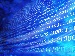 A digital image showing rows of glowing binary code (ones and zeroes) on a blue background, representing how AI processes and learns from large amounts of data.