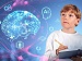 A young boy holding a notebook and pencil, looking thoughtfully at digital graphics of an AI brain and icons, symbolising learning and curiosity about artificial intelligence.