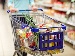 A supermarket shopping trolley filled with groceries, symbolising Waitrose’s trial of AI-powered smart trolleys that track items and prices in real time.