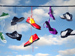 pairs of shoes hanging on a washing line