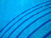 Curved lines on the bottom of a swimming pool
