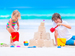 Children building a sandcastle