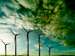 A wind farm against a dramatic sky