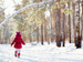 Young girl walking in snow