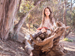 Girl outdoors reading a book