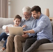 Parents wtih Children at Computer